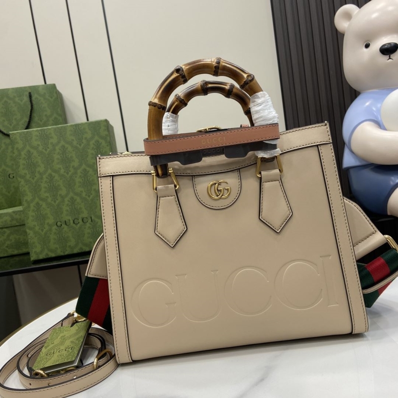 G*u*i shopping bags